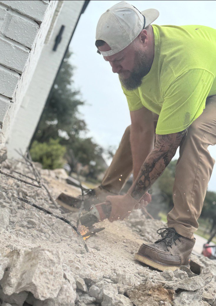 B.E.A.R craftsman using power tools on roofing project